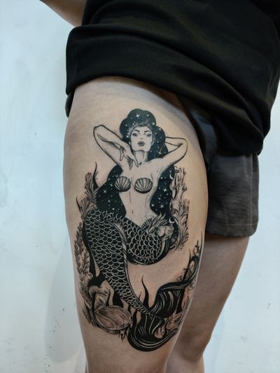 Capture the beauty of the stars and the sea with this illustrative tattoo by artist Mary Shalla.