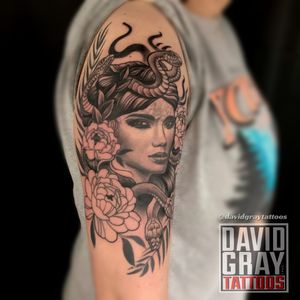 Medusa with roses tattoo