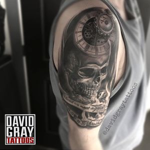 skull with time on his mind tattoo