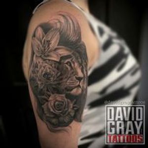Lion with flowers  Tattoo