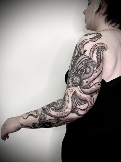 Unique dotwork style tattoo featuring a steampunk octopus design, by the talented artist Helena Velazquez.