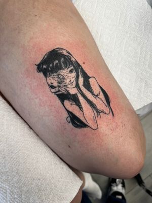 Get a hauntingly beautiful tattoo of the iconic character Tomie from Junji Ito's manga, done in stunning anime style by the talented artist Miss Vampira.