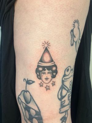 Celebrate a special woman's birthday with a traditional tattoo by Rachel Arfin. Timeless and meaningful design.