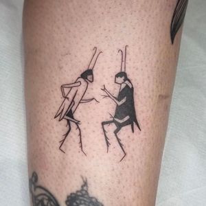 Immerse yourself in the playful world of Jonathan Glick's illustrative ignorant tattoo featuring a dancing cockroach. Let the rhythm guide you!