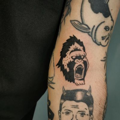 Get bold and fierce with this illustrative gorilla tattoo by renowned artist Jonathan Glick. Express your wild side.