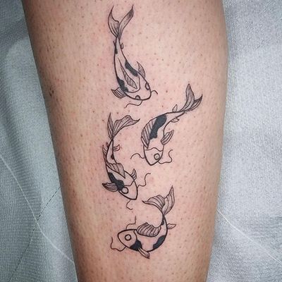 Get a beautifully detailed koi fish tattoo with intricate fine line work by the talented artist Jonathan Glick.