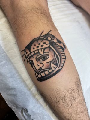 Get mesmerized by the intricate details of this neo-traditional tigerhead face tattoo done by Rich Phipson on your shin.