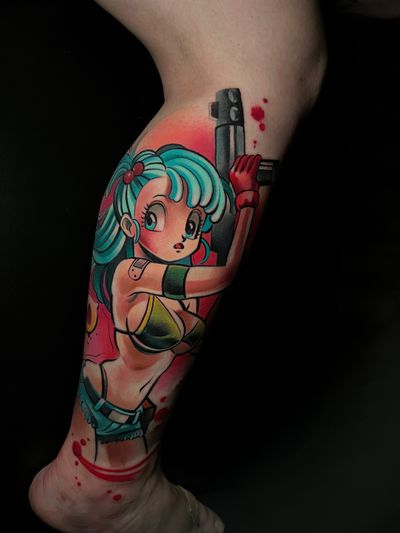 Vibrant new school tattoo on lower leg by Cloto.tattoos featuring a playful cartoon lady and gun motif.