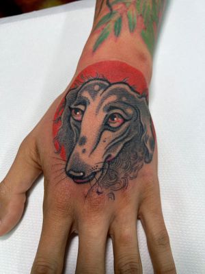Get a unique and detailed dog tattoo created by the talented artist Rich Phipson. Perfect for animal lovers seeking a one-of-a-kind design.
