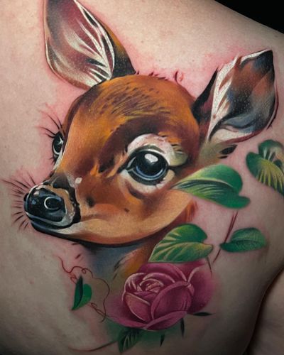 Get a stunning new school watercolor tattoo of a deer inspired by Bambi on your back by Cloto.tattoos.