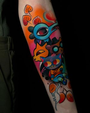 Express your playful side with this vibrant new school watercolor tattoo by Cloto.tattoos on your lower arm.