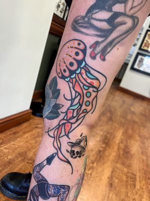 Experience the tranquility of the ocean with this stunning illustrative jellyfish tattoo by Rich Phipson. Perfect for ocean lovers!