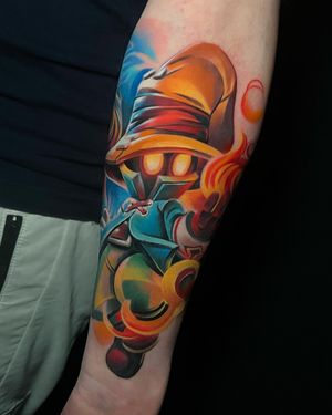 Get a vibrant new school cartoon tattoo on your lower arm by Cloto.tattoos for a fun and unique look!