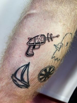 Get inked with a cool illustrative ray gun design by Jonathan Glick for a unique and edgy look. Embrace the future with this zapping tattoo!