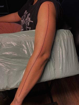 Unique and minimalist line design tattoo on the arm, expertly executed by artist Frankie Brown in an ignorant style.