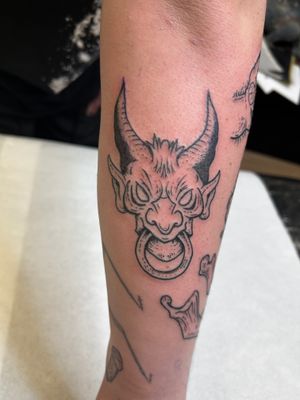 Get inked with a bold and fierce devil design in illustrative style by renowned artist Jonathan Glick.