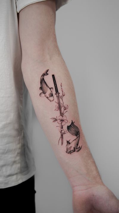 Elegant fine line design featuring sakura, sword, and koi elements, expertly executed by tattoo artist Jacky Yang.