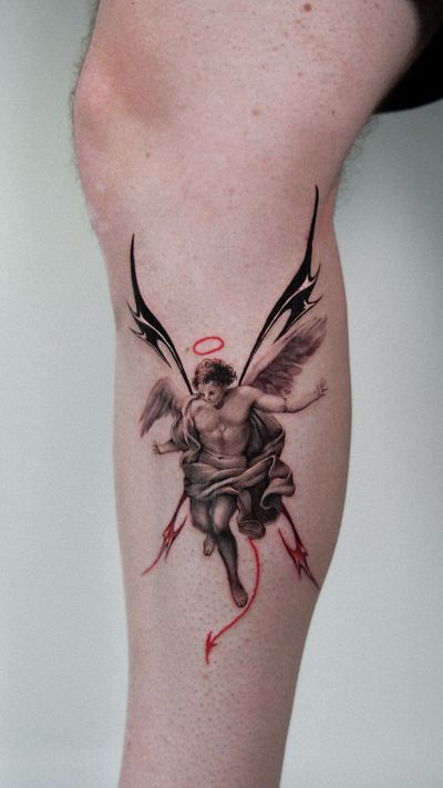 Striking lower leg tattoo featuring a devil and angel motif, expertly executed in micro realism style by Jacky Yang.