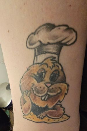 Done at DarkStar Tattoo in Punxsutawney, PA. The artist who did it was the grandson of the lady who designed this particular Punxsutawney Phil for the town to use. 