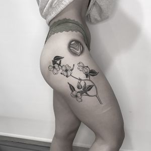 Get a stunning botanical tattoo of an orchid in dotwork style by talented artist Oliver Whiting.