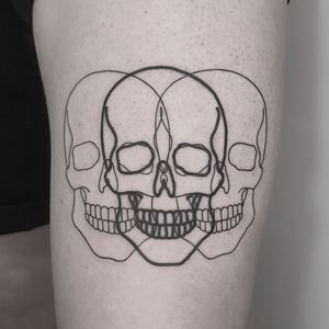 Experience the intricate detail and abstract beauty of this unique skull tattoo. Created by the talented artist Oliver Whiting.