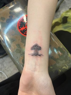 Get lost in the enchanting world of Clayton Jeremiah's illustrative mushroom tattoo design. Perfect for nature lovers!