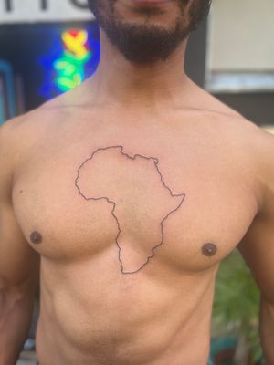 Get a beautifully detailed illustrative tattoo of the map of Africa by the talented Clayton Jeremiah.