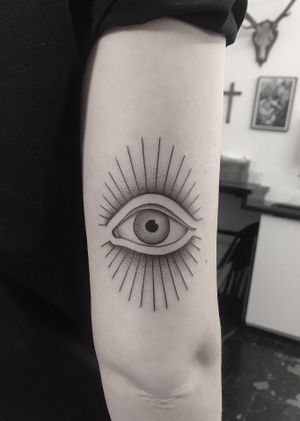 Dive into the intricate world of dotwork and fine line with this mesmerizing illustrative eye tattoo by Oliver Whiting.