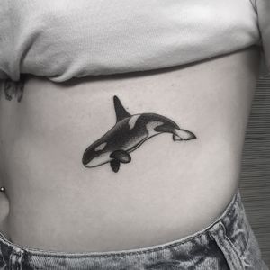 Experience the beauty of dotwork with this intricate and detailed orca whale design by tattoo artist Oliver Whiting.