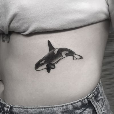 Experience the beauty of dotwork with this intricate and detailed orca whale design by tattoo artist Oliver Whiting.