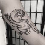 A stunning dotwork panther tattoo combining illustrative and traditional styles by renowned artist Oliver Whiting.