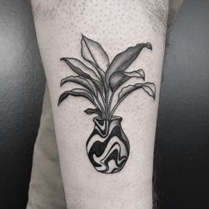 Unique black and gray dotwork design by Oliver Whiting featuring a flowing abstract plant motif in a vase.