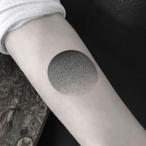 Experience the magic of the moon with this intricate dotwork and illustrative style tattoo by artist Oliver Whiting.