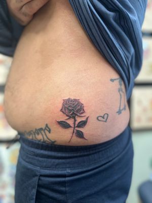 Experience the beauty of a timeless rose design brought to life in vivid illustration by tattoo artist Clayton Jeremiah. A stunning and unique piece for any tattoo enthusiast.