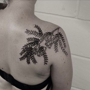 Get a unique dotwork kōwhai tattoo by talented artist Oliver Whiting for a truly original piece of body art.