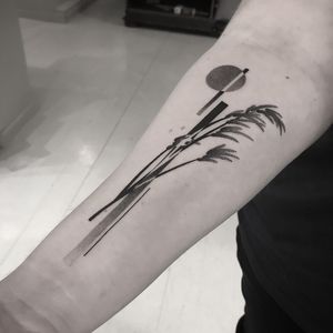 Unique dotwork tattoo featuring a typha plant in a geometric frame by talented artist Oliver Whiting.