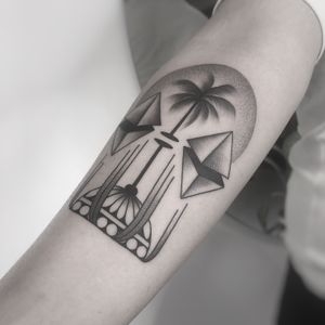 Unique dotwork and illustrative design by tattoo artist Oliver Whiting, featuring a symmetrical blend of palm tree and pyramid in abstract style.