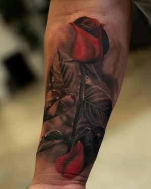 Get a stunning and lifelike rose tattoo done by the talented artist Abel Lopez. Embrace the beauty of nature with this exquisite piece of art.