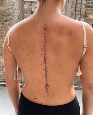 Subtle yet striking small lettering design on the back by talented artist Ion Caraman.