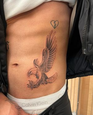 Experience the fierce elegance of an illustrative eagle tattoo by Ion Caraman. Perfect for nature lovers and bird enthusiasts.