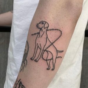 Capture the essence of man's best friend with this beautifully detailed illustrative dog outline tattoo by talented artist Charlie Macarthur.