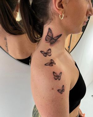 Experience the delicate beauty of fine line micro-realism with this stunning butterfly tattoo design by master artist Ion Caraman.