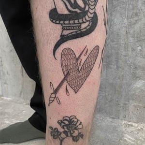 Unique tattoo by Charlie Macarthur featuring a heart and brush motif in the ignorant style.