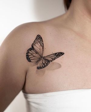 Capture the delicate beauty of a butterfly in stunning black and gray micro realism by Ion Caraman.