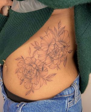 Beautiful flower motif design by Ion Caraman, perfect for rib placement with a touch of elegance.