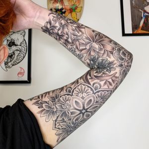 Unique dotwork and illustrative design by Karen Buckley, combining intricate mandala with beautiful floral elements.
