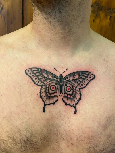 Beautiful illustrative and traditional tattoo featuring a butterfly and moth by Claudia Vicente. Perfect for nature lovers.
