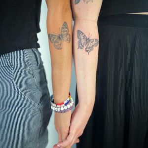 Captivating fine line illustration of a butterfly couple by the talented artist Paula.
