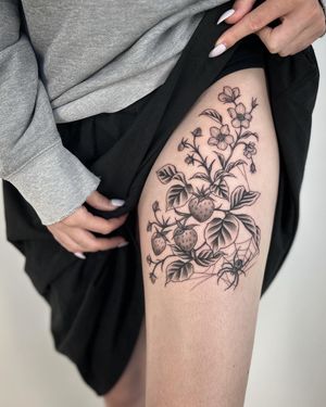 Get a unique tattoo featuring a spider, fruit, lily, strawberry, and spider web. Let Paula bring your vision to life with her illustrative style.