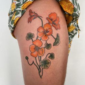 This stunning illustrative tattoo by Paula features a beautiful ginko flower motif, perfect for botanical enthusiasts.